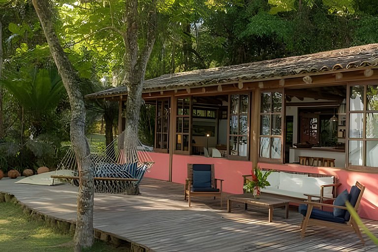 Casa pé na areia com acesso só de barco