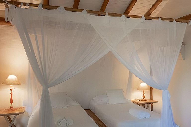 Casa pé na areia com acesso só de barco